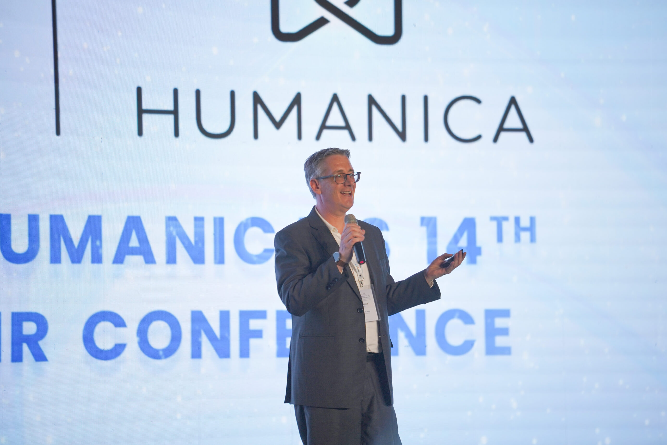 President-Director-and-Group-CTO-of-DataOn-Humanica-on-stage-during-the-conference-scaled.jpg